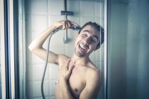 Happy man in the shower